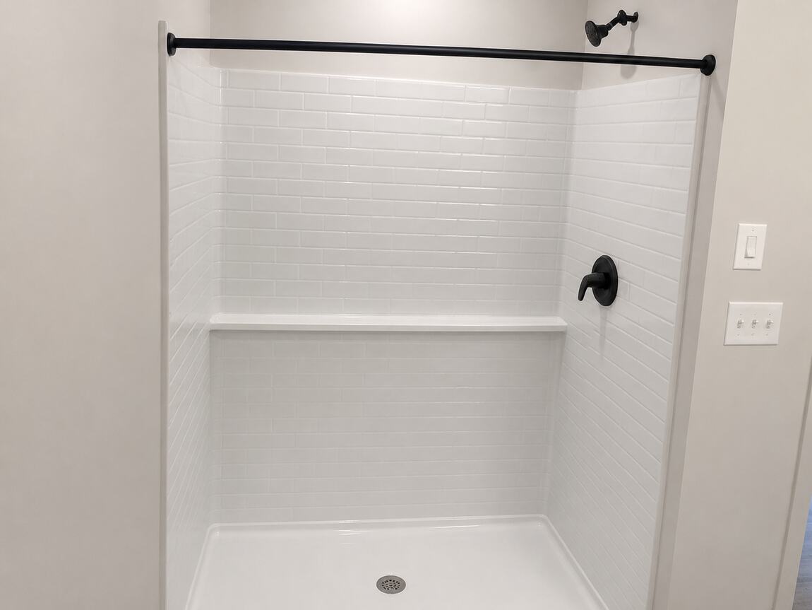 Tiled shower with a built-in bench